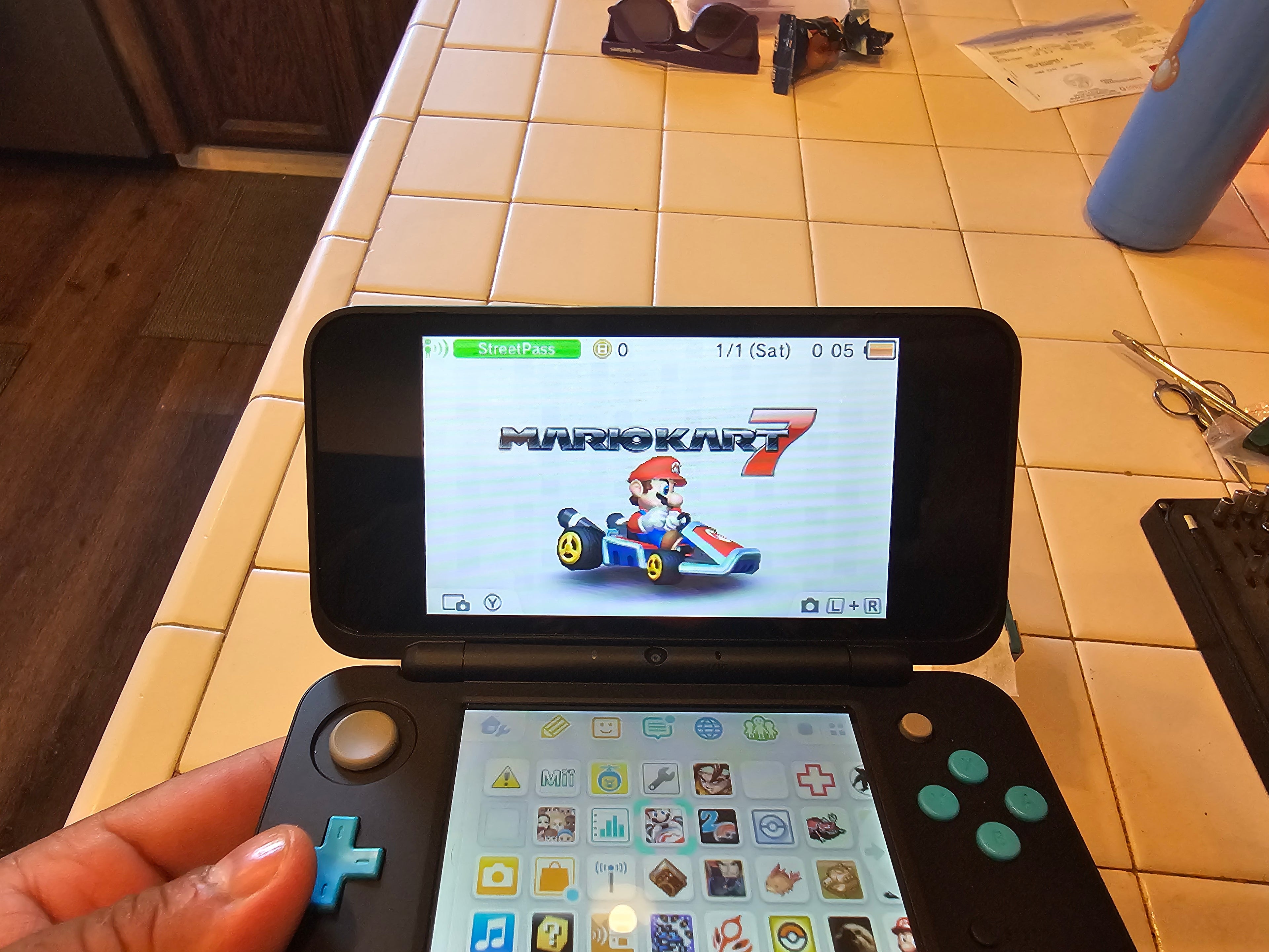 new 2ds xl turquoise 128gb with games