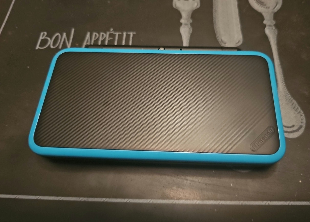 new 2ds xl turquoise 128gb with games