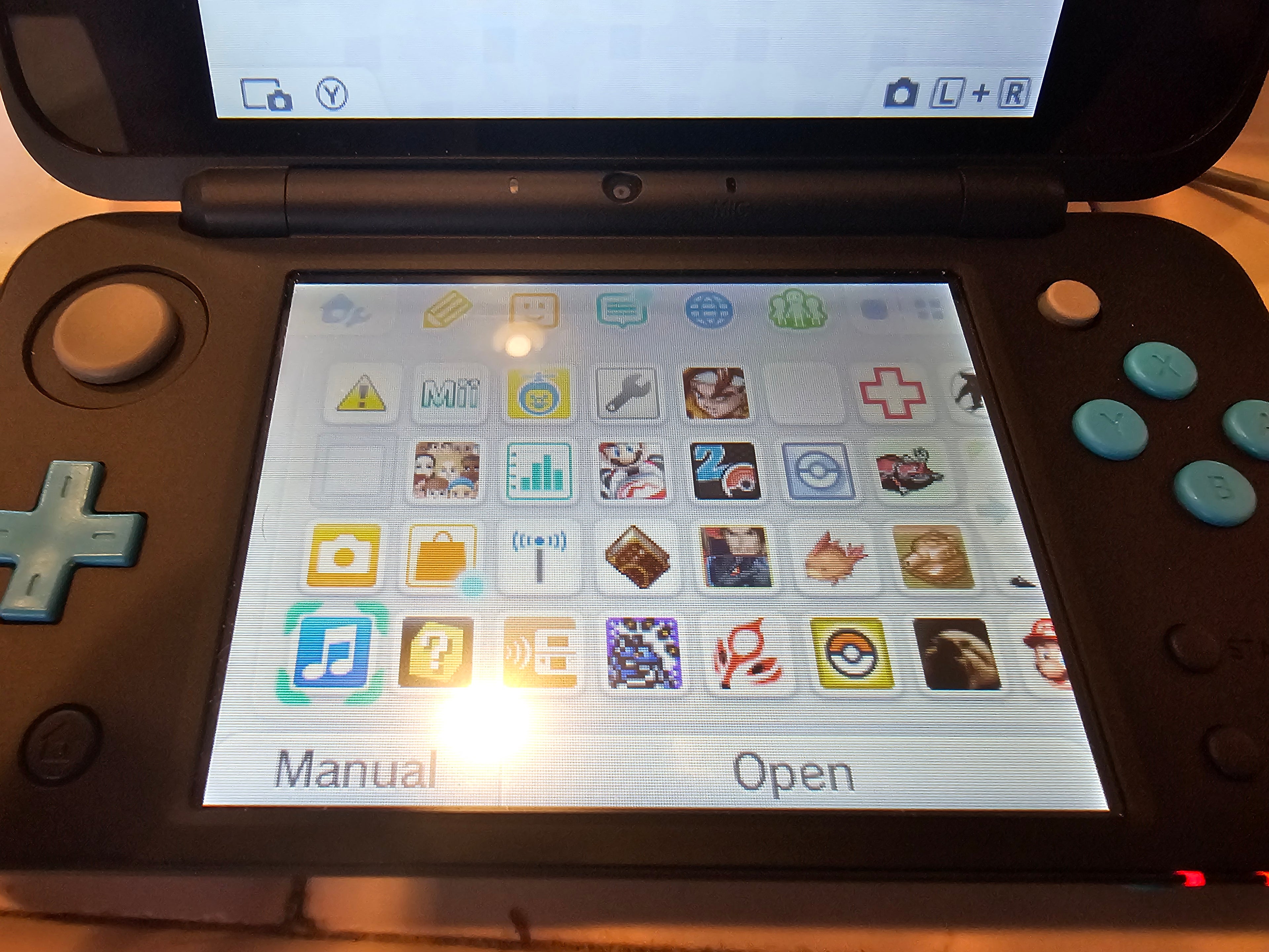 new 2ds xl turquoise 128gb with games